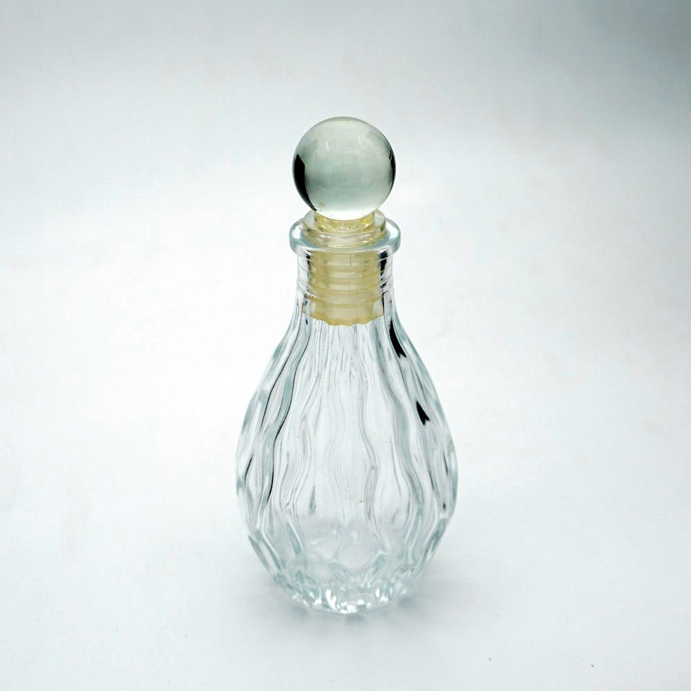 FTES-110 * 110 ml Cam Kapaklı Desenli Teşhir Şişesi FTES-110 * 110 ml Cam Kapaklı Desenli Teşhir Şişesi